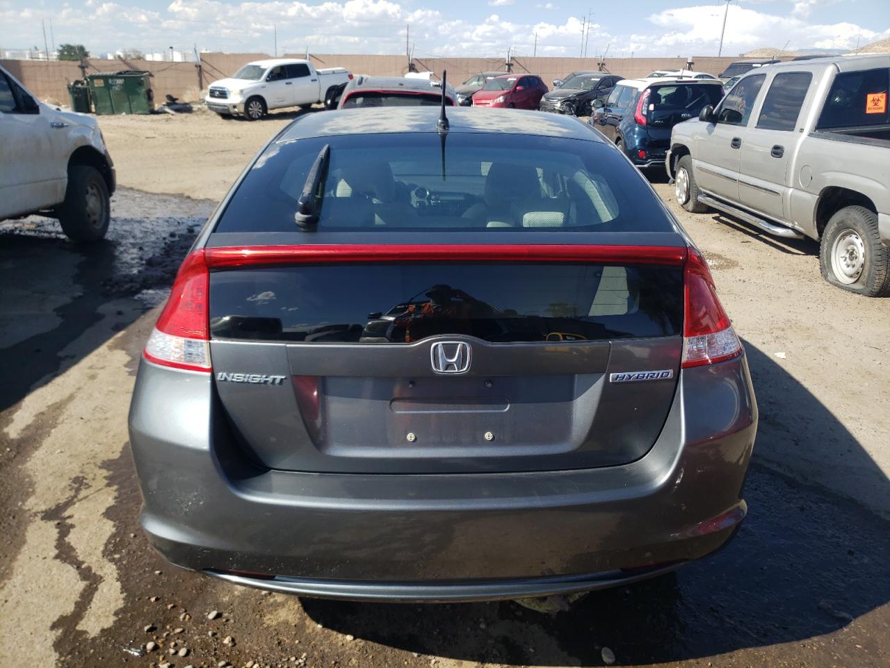 2011 Honda Insight Ex VIN: JHMZE2H73BS002725 Lot: 66884544