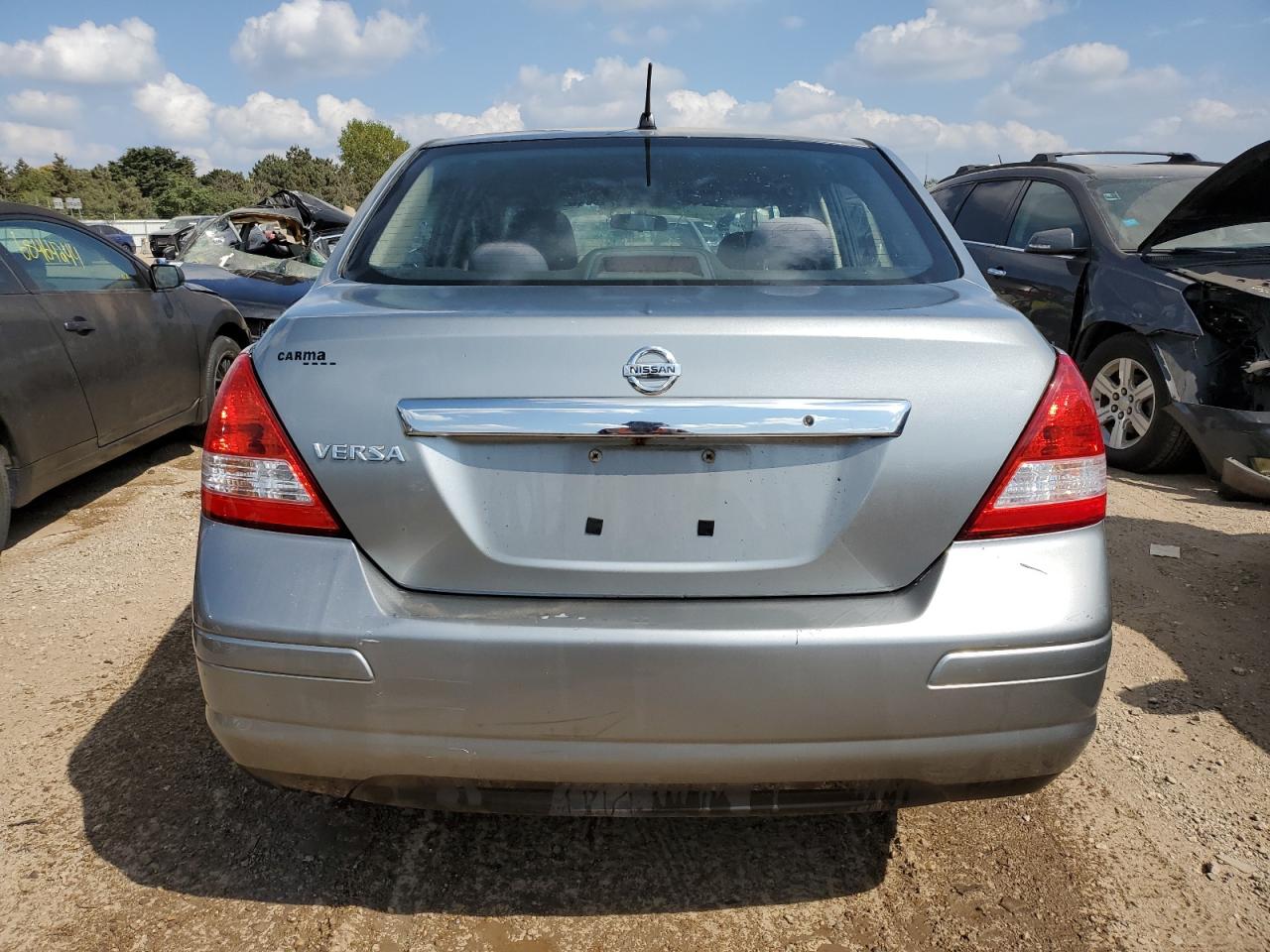 2009 Nissan Versa S VIN: 3N1BC11E59L447913 Lot: 68760664