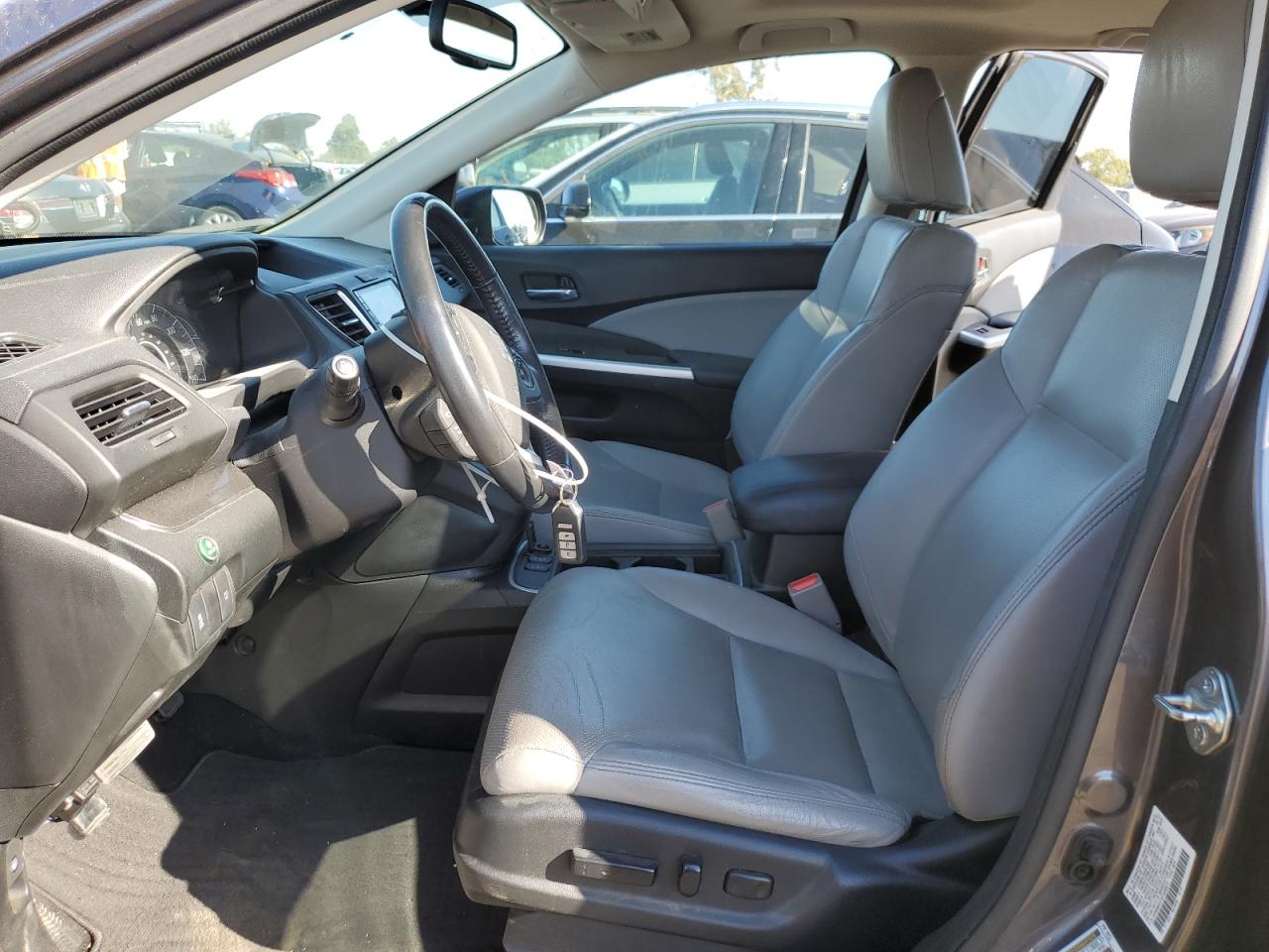 2015 Honda Cr-V Exl VIN: 2HKRM4H7XFH648672 Lot: 65622084