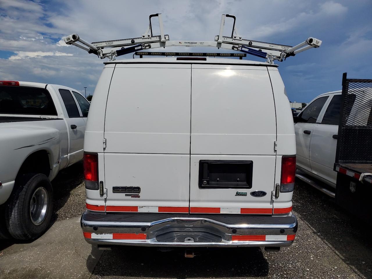 2014 Ford Econoline E350 Super Duty Van VIN: 1FTSE3EL5EDB10735 Lot: 64791814