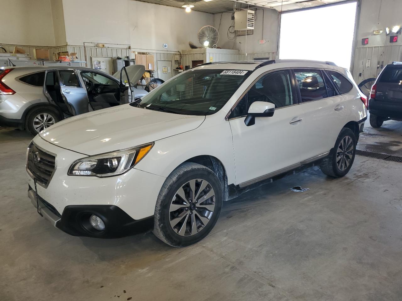 2017 Subaru Outback Touring VIN: 4S4BSETC9H3235976 Lot: 68118404