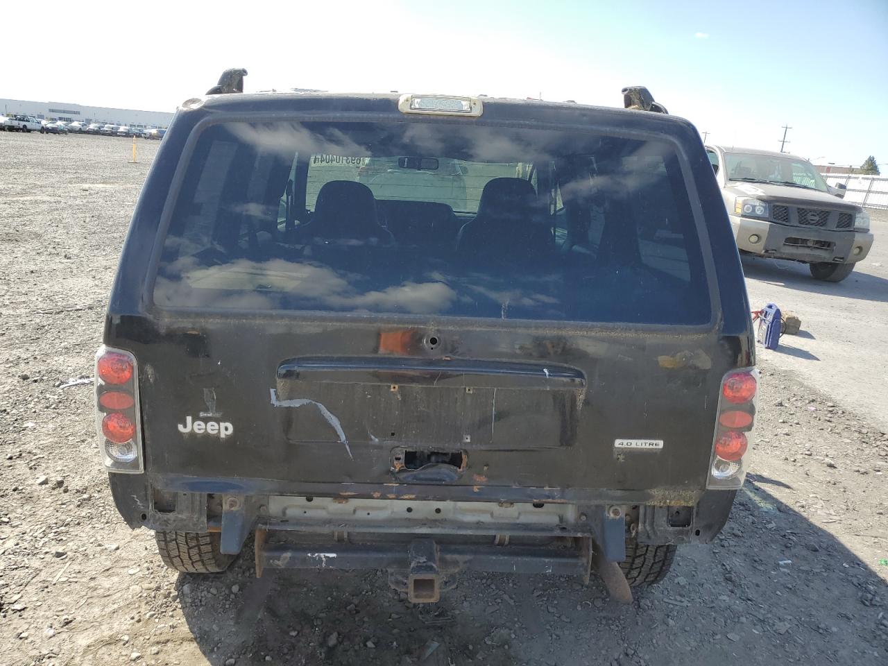 2000 Jeep Cherokee Sport VIN: 1J4FF48S5YL270285 Lot: 69310404