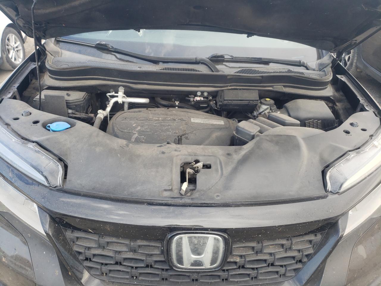 2020 Honda Passport Elite VIN: 5FNYF8H09LB013937 Lot: 65032544