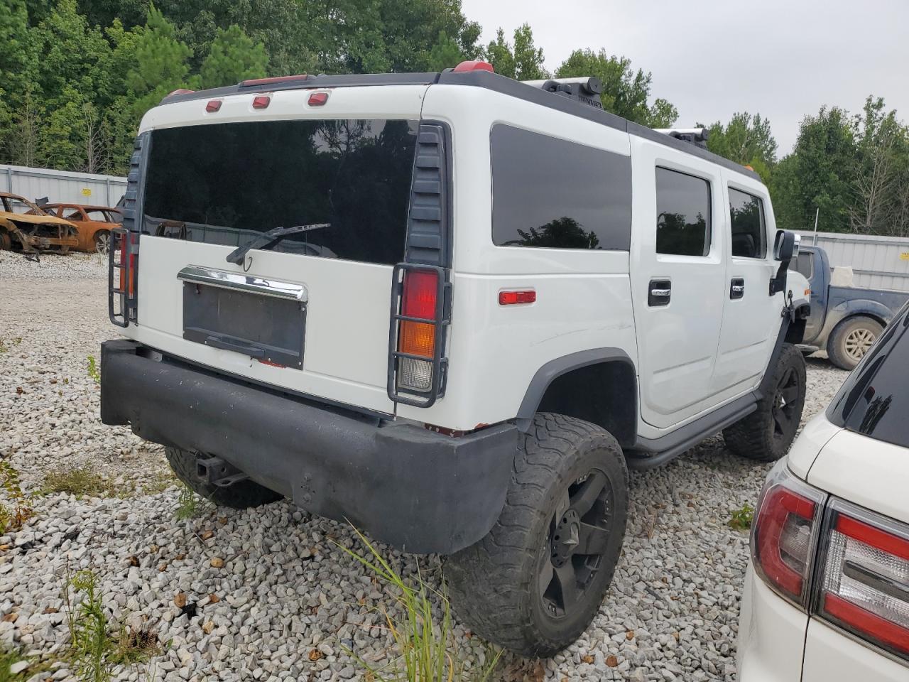 2003 Hummer H2 VIN: 5GRGN23U63H119623 Lot: 64667574