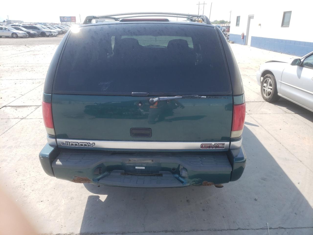 1998 GMC Jimmy VIN: 1GKDT13W8W2569355 Lot: 65409604