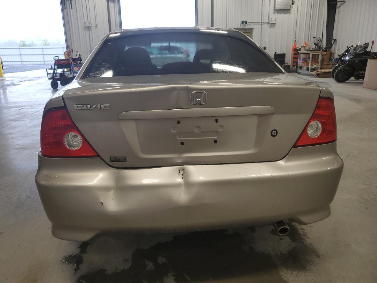 2004 Honda Civic Lx VIN: 1HGEM22574L800945 Lot: 66737674