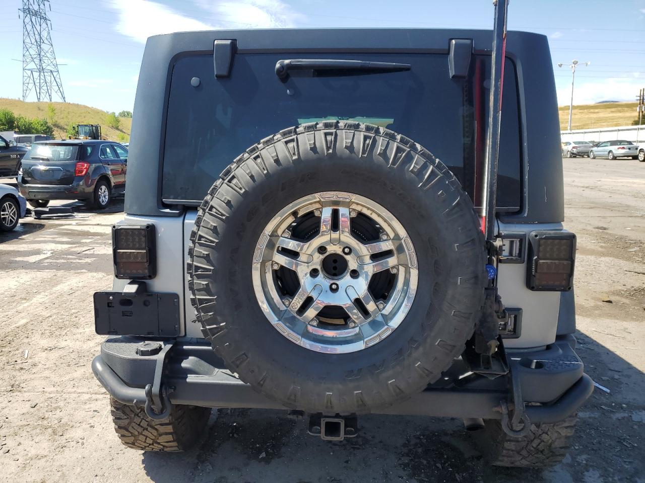 1C4BJWDGXDL658977 2013 Jeep Wrangler Unlimited Sport