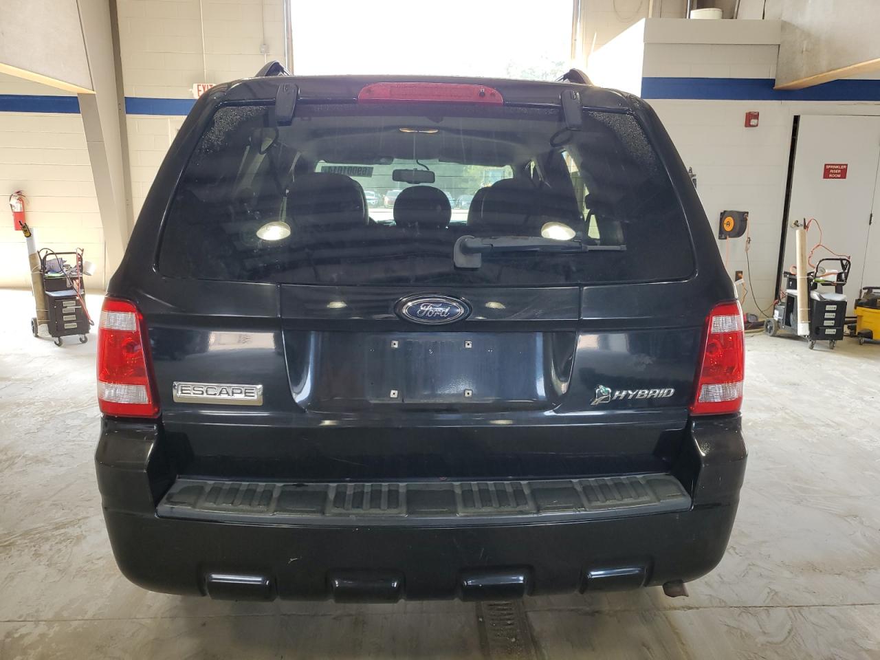 2009 Ford Escape Hybrid VIN: 1FMCU59309KA49062 Lot: 69001014