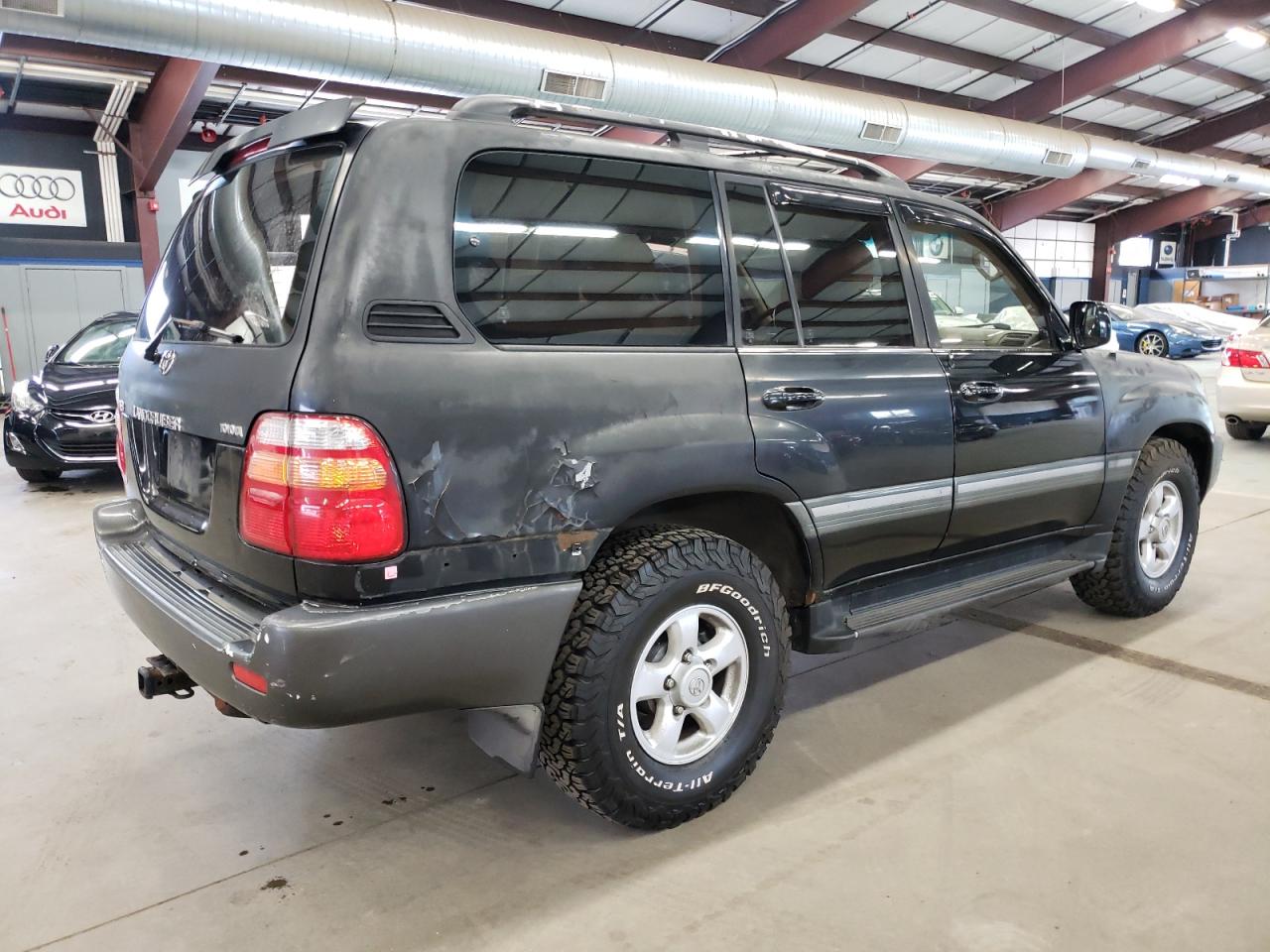 1999 Toyota Land Cruiser VIN: JT3HT05J2X0064180 Lot: 66560574