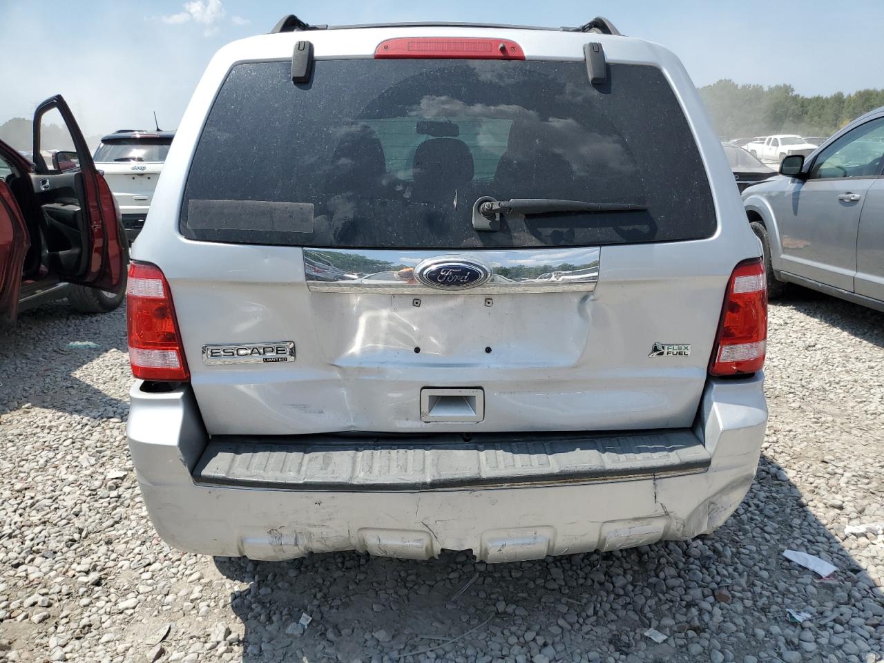 2010 Ford Escape Limited VIN: 1FMCU9EG2AKB61592 Lot: 68477864