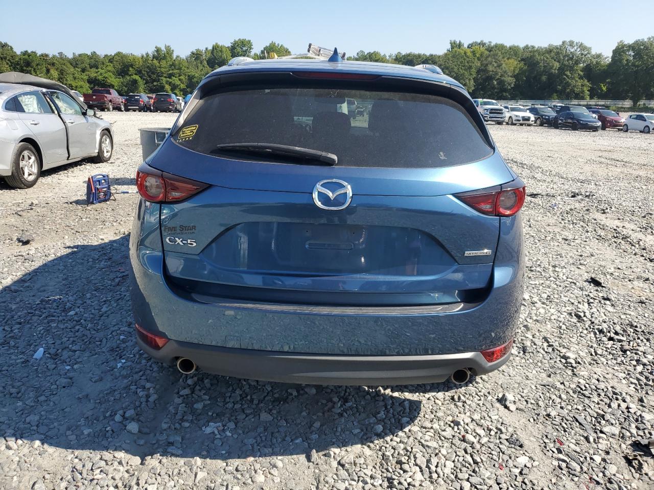 2021 Mazda Cx-5 Touring VIN: JM3KFACM6M0395858 Lot: 71758754