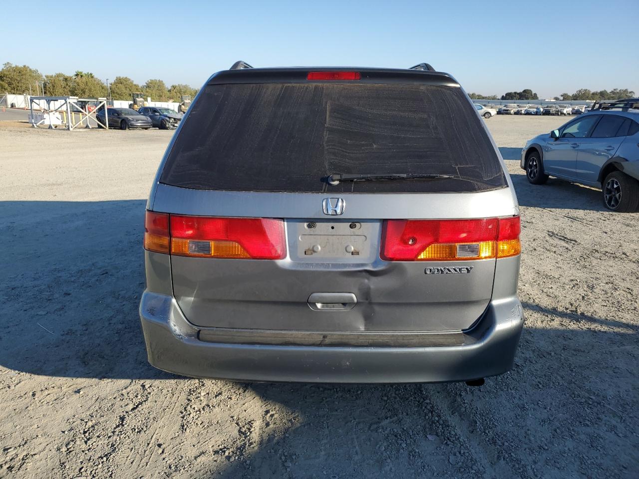 2002 Honda Odyssey Exl VIN: 2HKRL18012H516804 Lot: 66859284