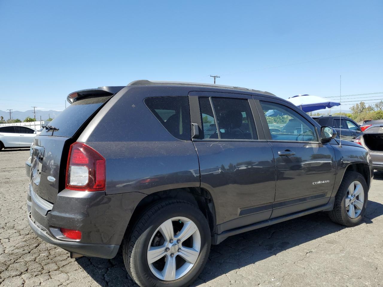 2015 Jeep Compass Latitude VIN: 1C4NJDEB0FD216565 Lot: 66992174