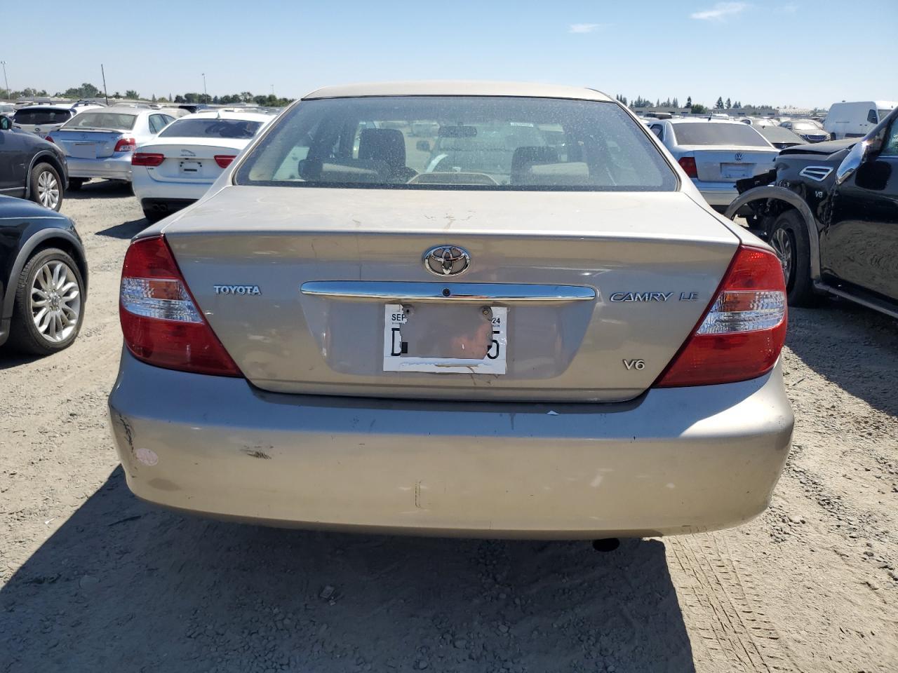 2003 Toyota Camry Le VIN: 4T1BF30K63U046290 Lot: 66022744