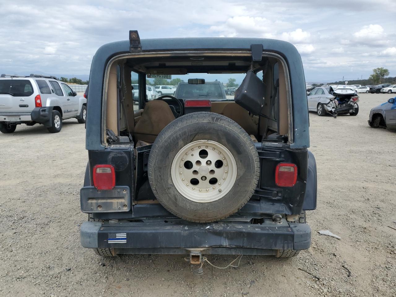 1998 Jeep Wrangler / Tj Sahara VIN: 1J4FY49S6WP740550 Lot: 68754564