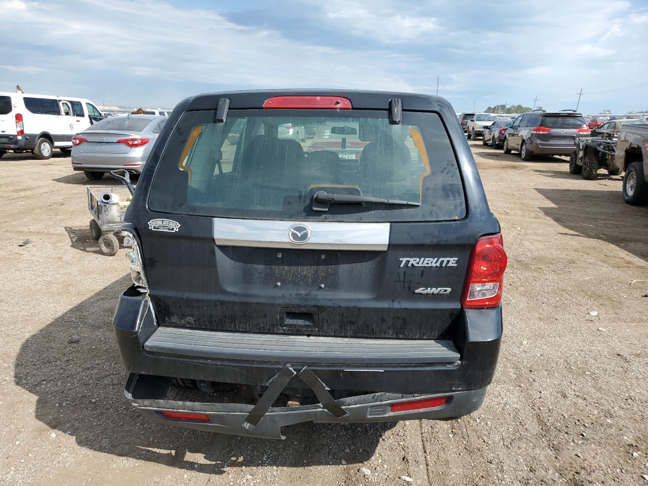 2010 Mazda Tribute I VIN: 4F2CY9C75AKM02945 Lot: 67784674