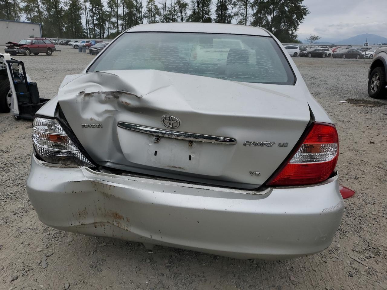 2003 Toyota Camry Le VIN: 4T1BF32K63U562467 Lot: 66983784