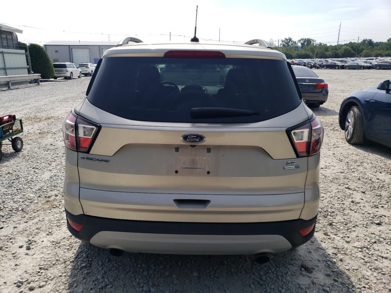 2018 Ford Escape Se VIN: 1FMCU9GD5JUA75166 Lot: 69297354