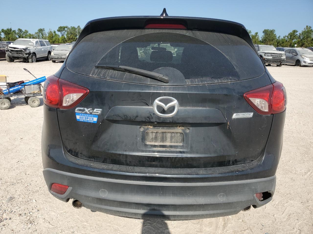 2015 Mazda Cx-5 Touring VIN: JM3KE2CY1F0459884 Lot: 66023574