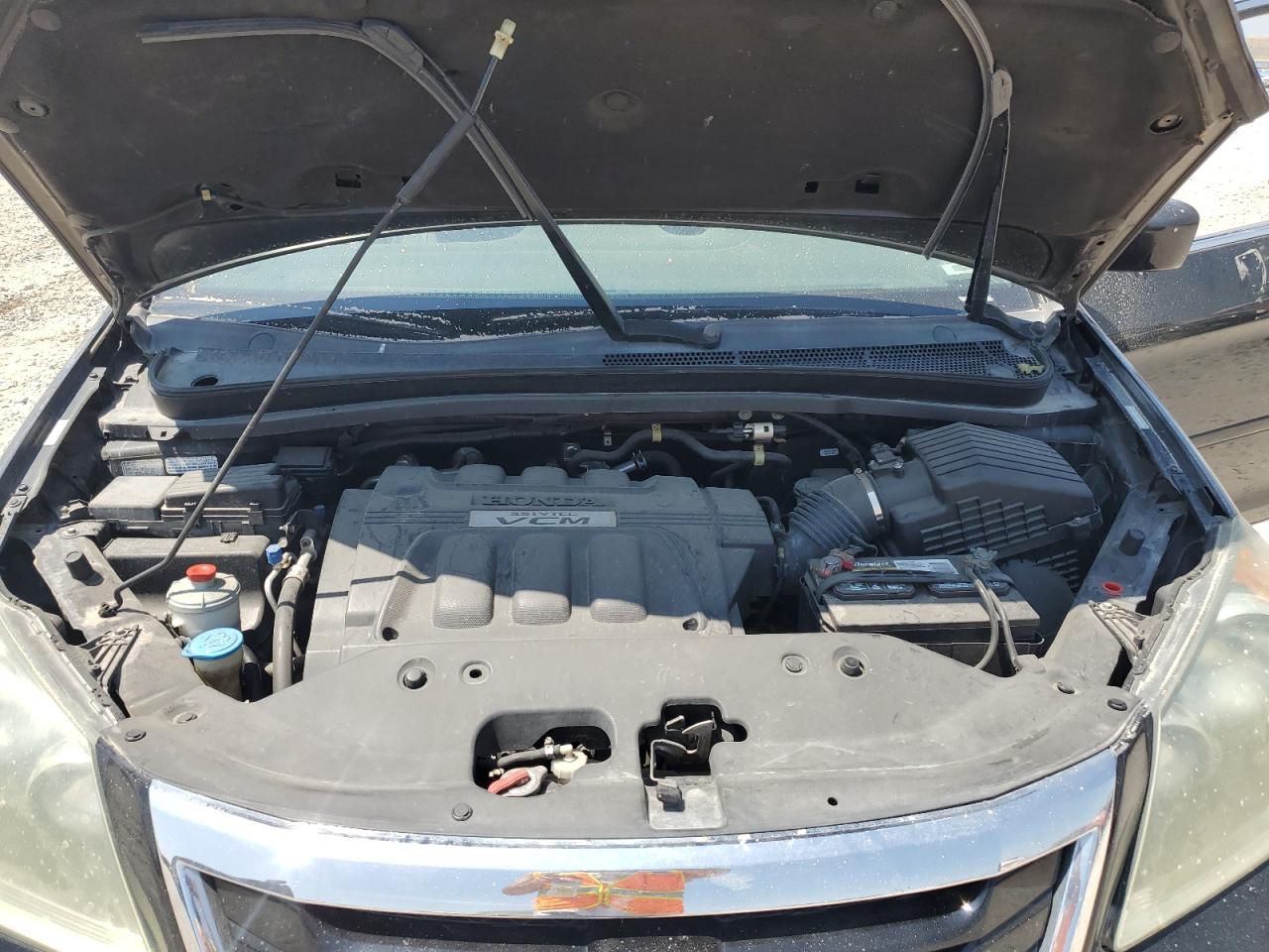 2010 Honda Odyssey Exl VIN: 5FNRL3H60AB054877 Lot: 65858324