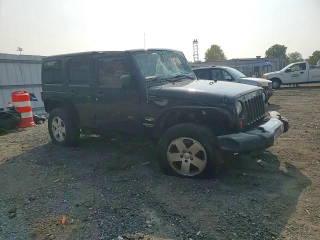 2011 Jeep Wrangler Unlimited Sahara VIN: 1J4HA5H15BL632885 Lot: 66936184