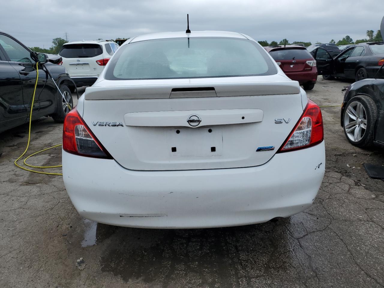 2013 Nissan Versa S VIN: 3N1CN7AP7DL852120 Lot: 65182774