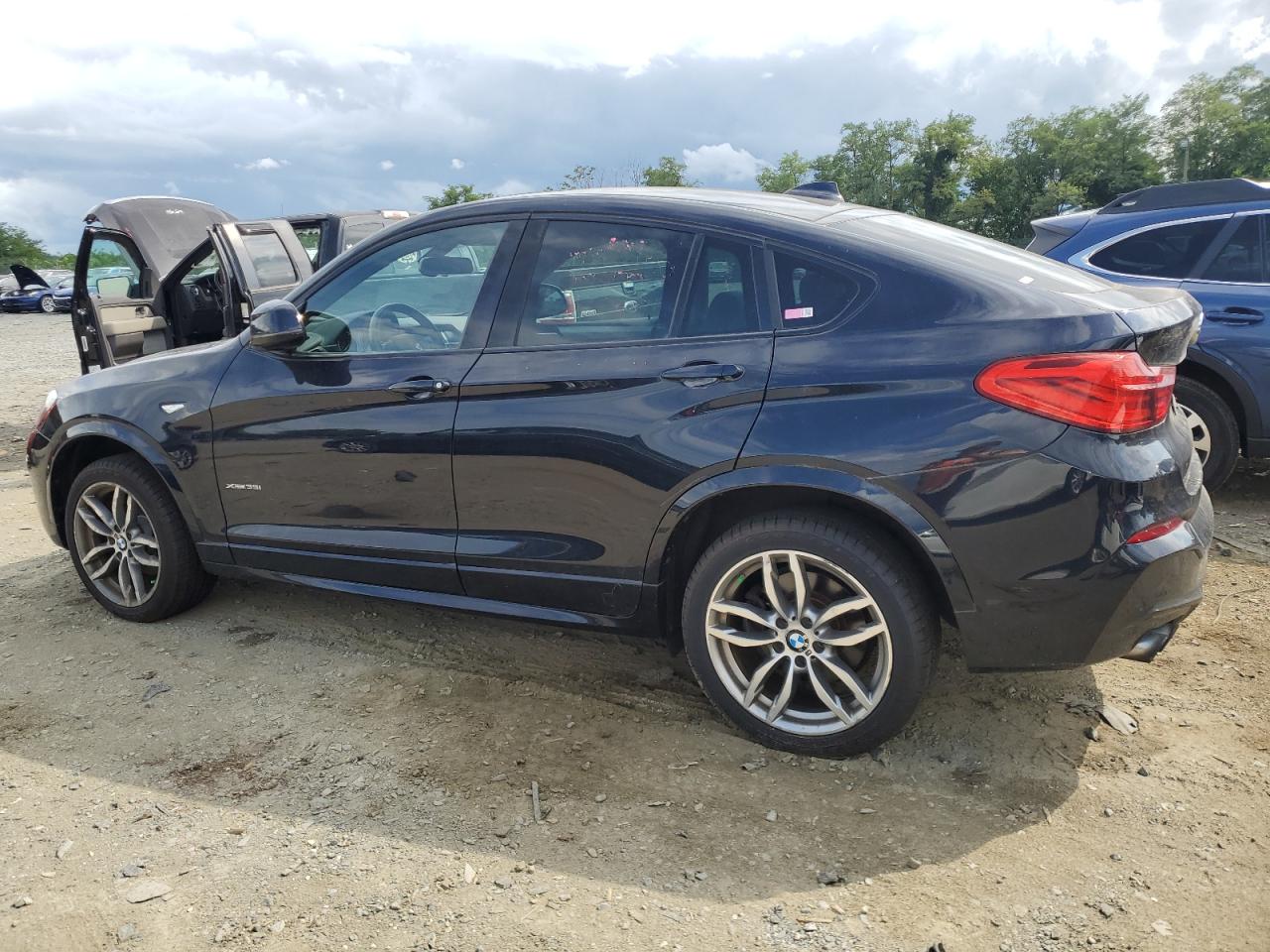 2016 BMW X4 xDrive35I VIN: 5UXXW5C58G0N92693 Lot: 66104094