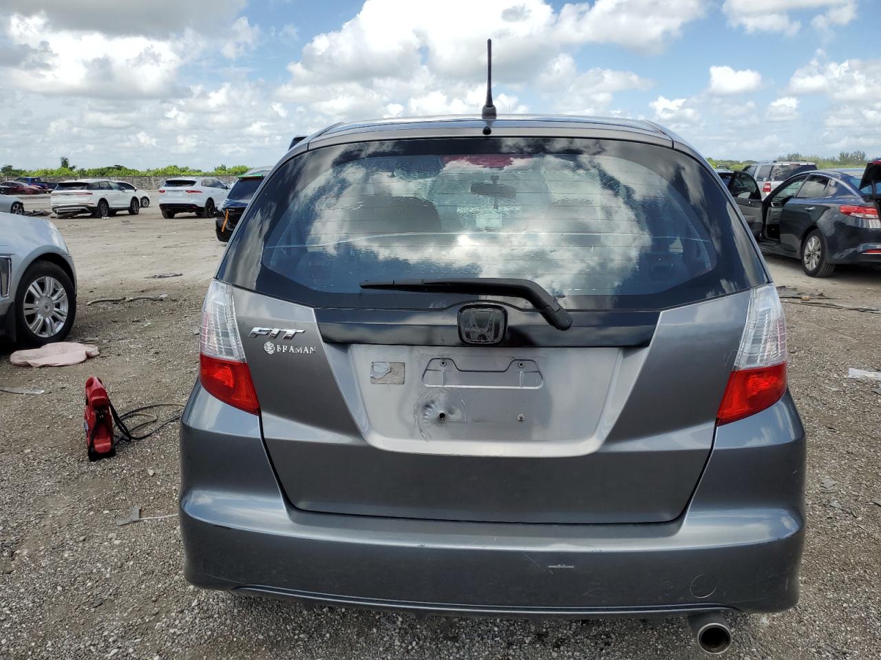 2013 Honda Fit VIN: JHMGE8H3XDC074557 Lot: 65516974