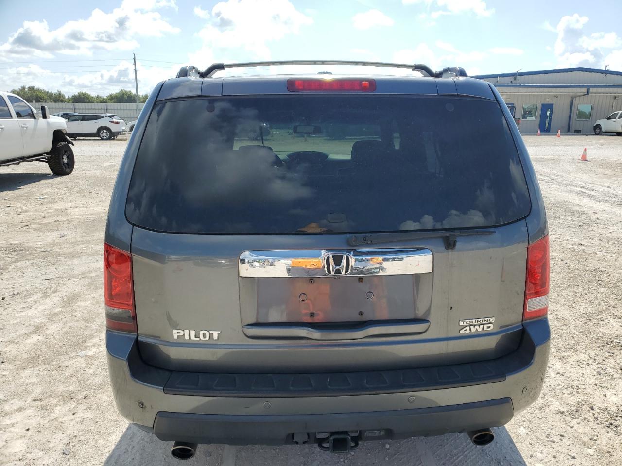 2011 Honda Pilot Touring VIN: 5FNYF4H91BB042211 Lot: 66540674