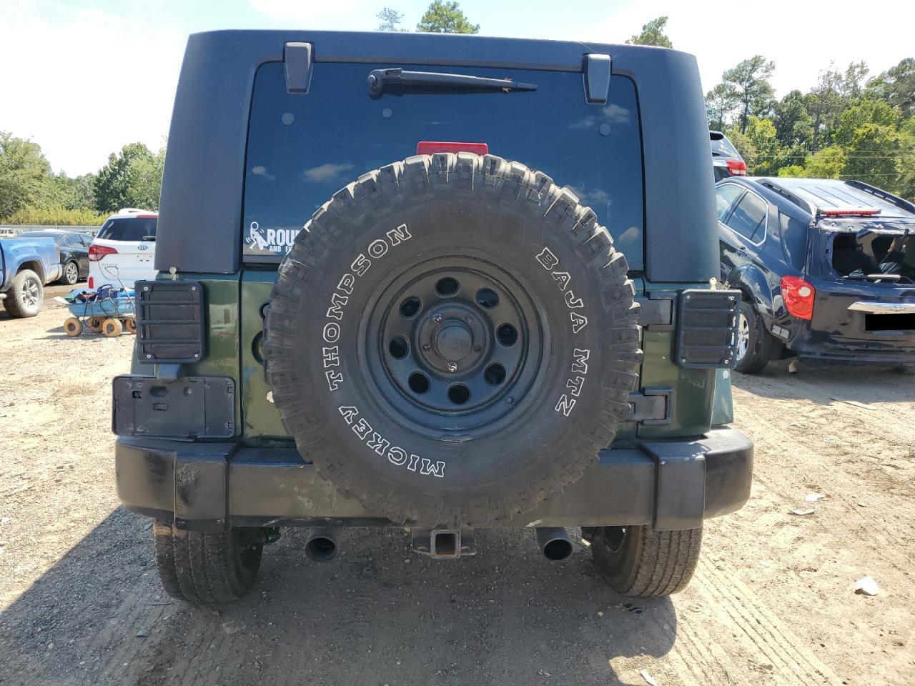 2007 Jeep Wrangler Sahara VIN: 1J4GA59197L107829 Lot: 67709544