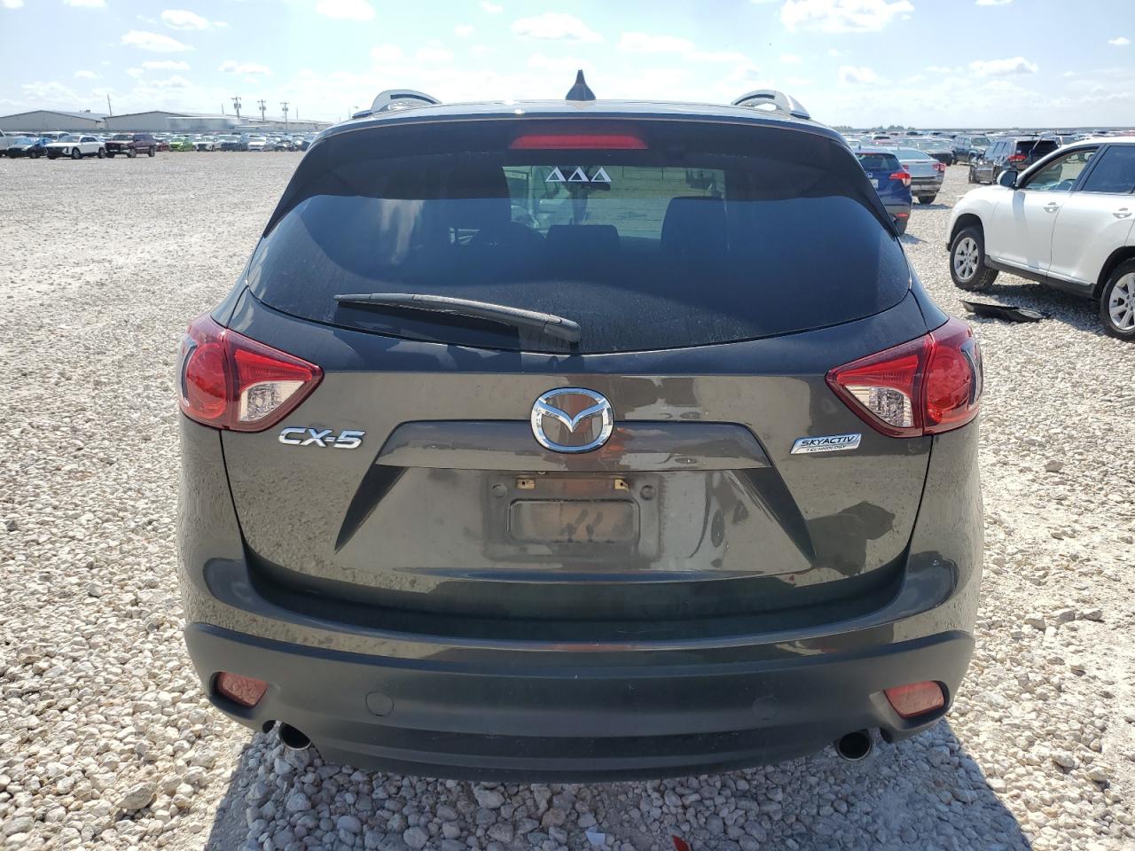 2016 Mazda Cx-5 Touring VIN: JM3KE2CY5G0638351 Lot: 69001994