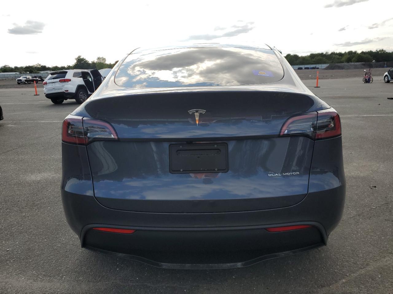 2023 Tesla Model Y VIN: 7SAYGDEE0PA177413 Lot: 68116674