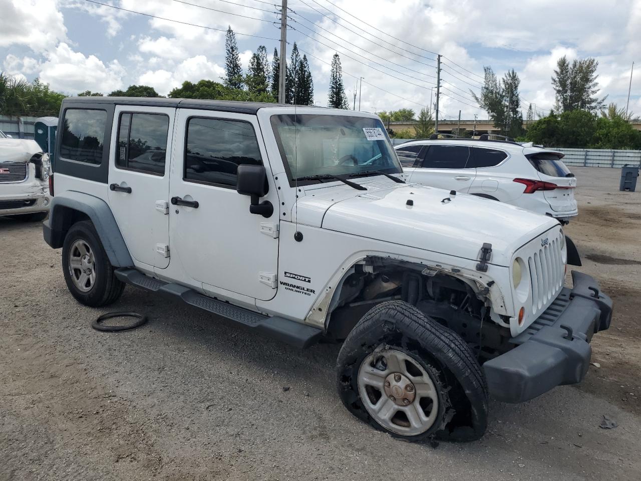 2012 Jeep Wrangler Unlimited Sport VIN: 1C4BJWDG1CL141372 Lot: 65678744