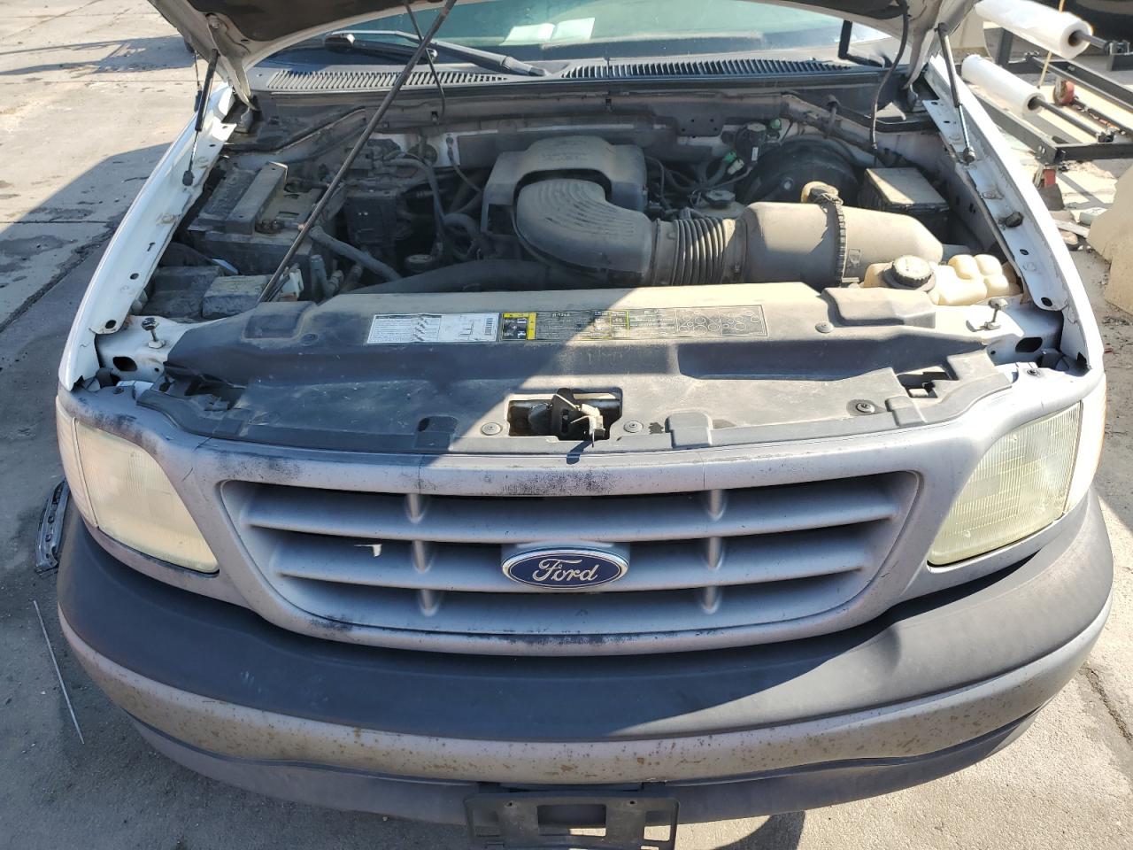 2002 Ford F150 VIN: 1FTRX17W82NA89129 Lot: 66047394