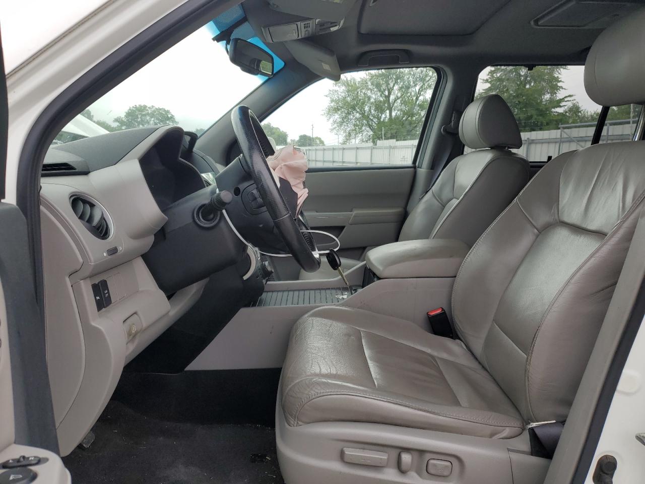 2011 Honda Pilot Touring VIN: 5FNYF4H92BB071328 Lot: 65141704