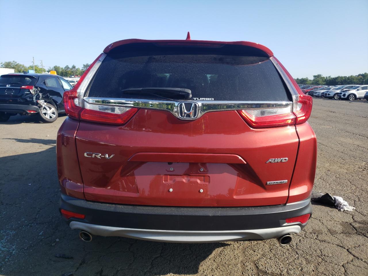 2018 Honda Cr-V Touring VIN: 2HKRW2H94JH136995 Lot: 69770264