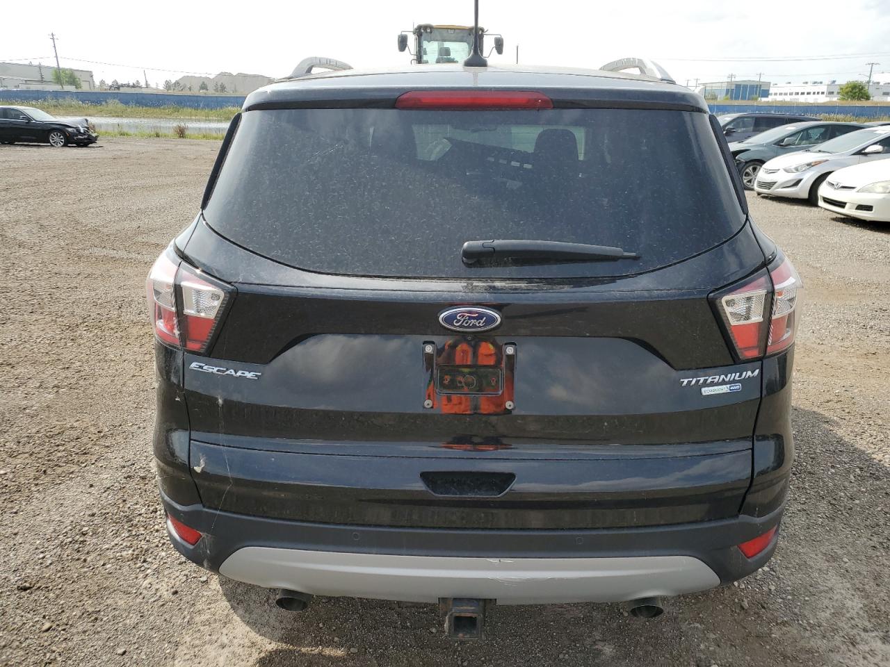 2018 Ford Escape Titanium VIN: 1FMCU9J92JUB31777 Lot: 69046332