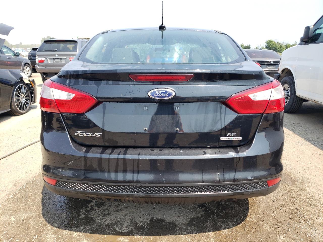 2014 Ford Focus Se VIN: 1FADP3F29EL364596 Lot: 65012404