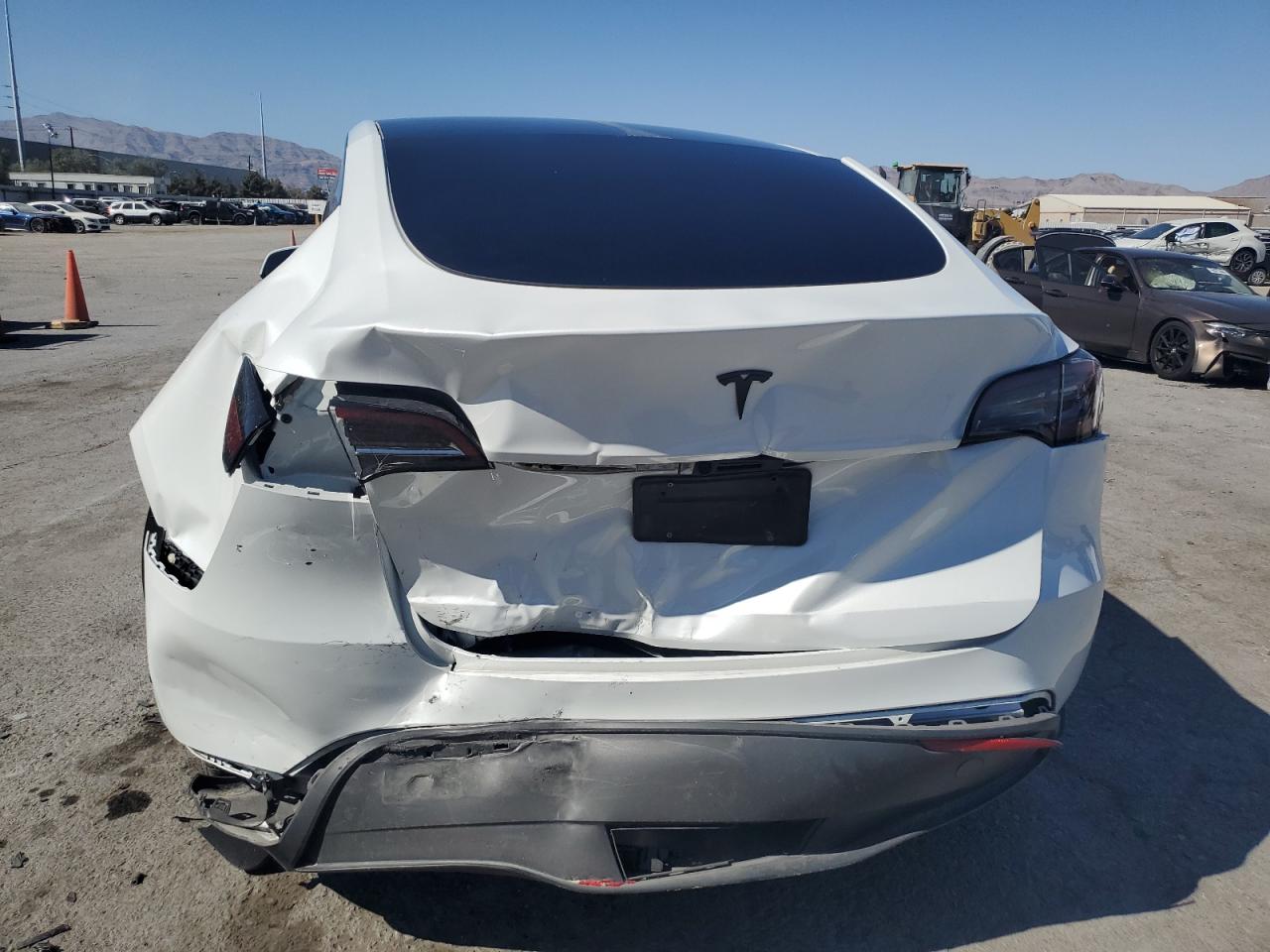 2023 Tesla Model Y VIN: 7SAYGDEEXPF617558 Lot: 69336404