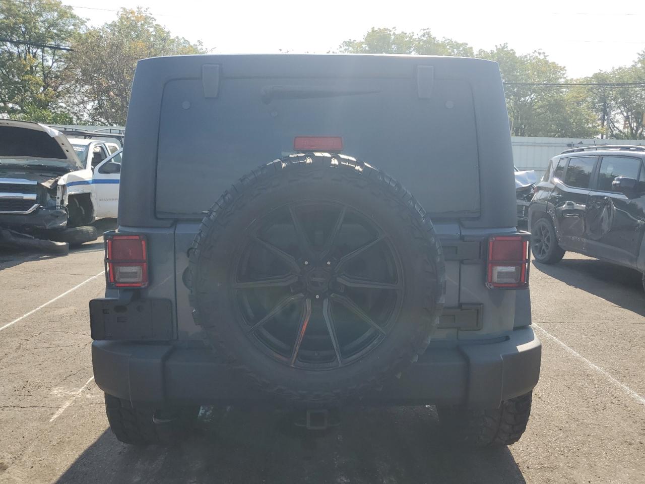 1C4BJWDG7EL156266 2014 Jeep Wrangler Unlimited Sport