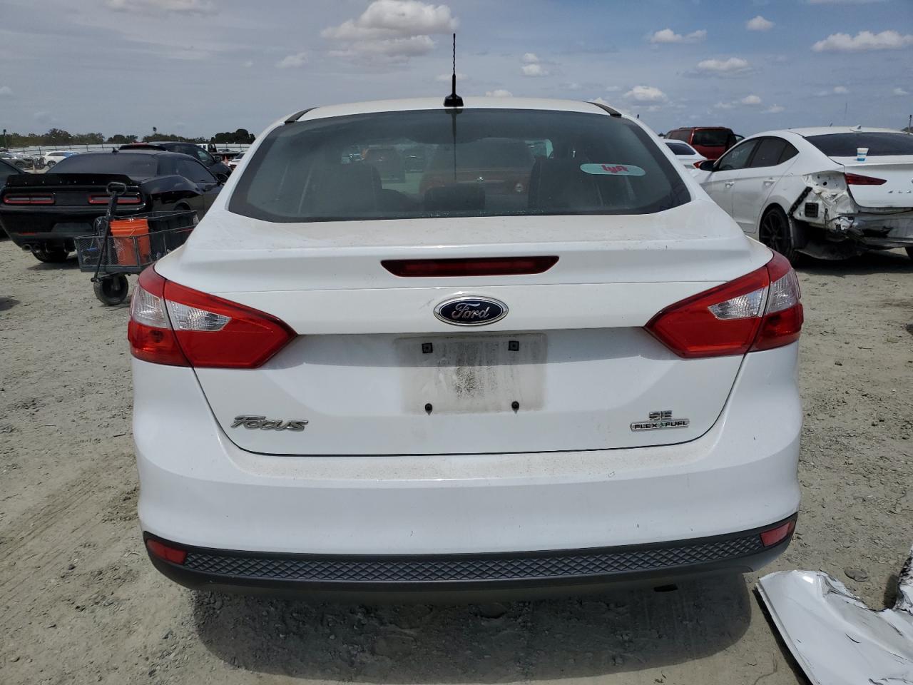 2014 Ford Focus Se VIN: 1FADP3F24EL277141 Lot: 68205904