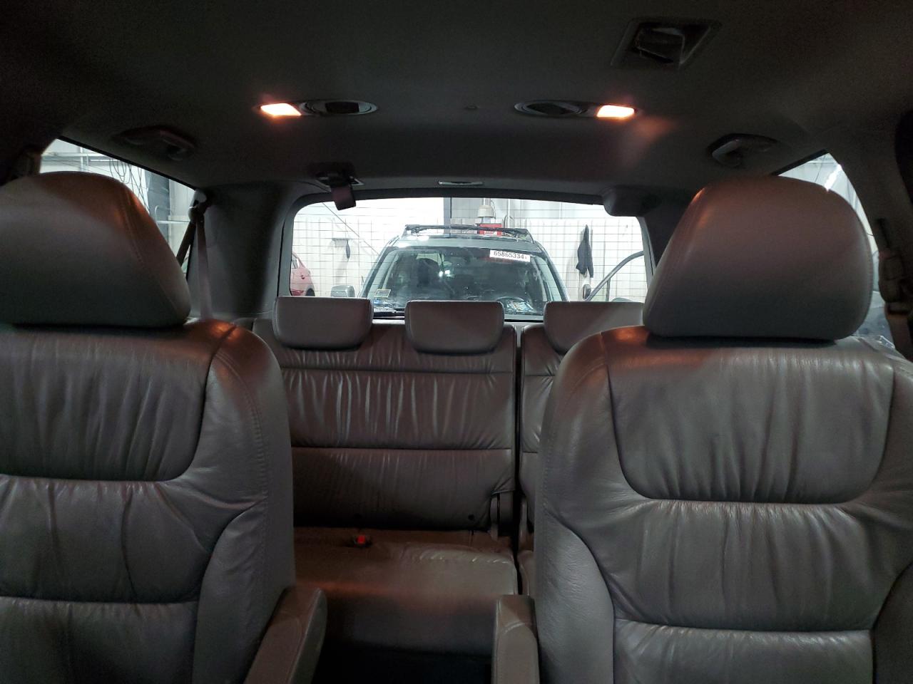 2010 Honda Odyssey Exl VIN: 5FNRL3H79AB057981 Lot: 65465354