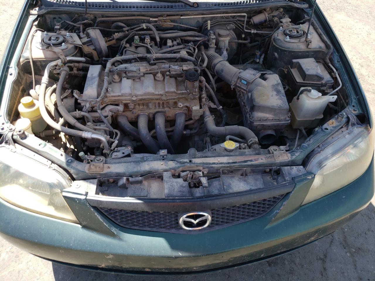 2002 Mazda Protege Dx VIN: JM1BJ226X21573150 Lot: 67855674