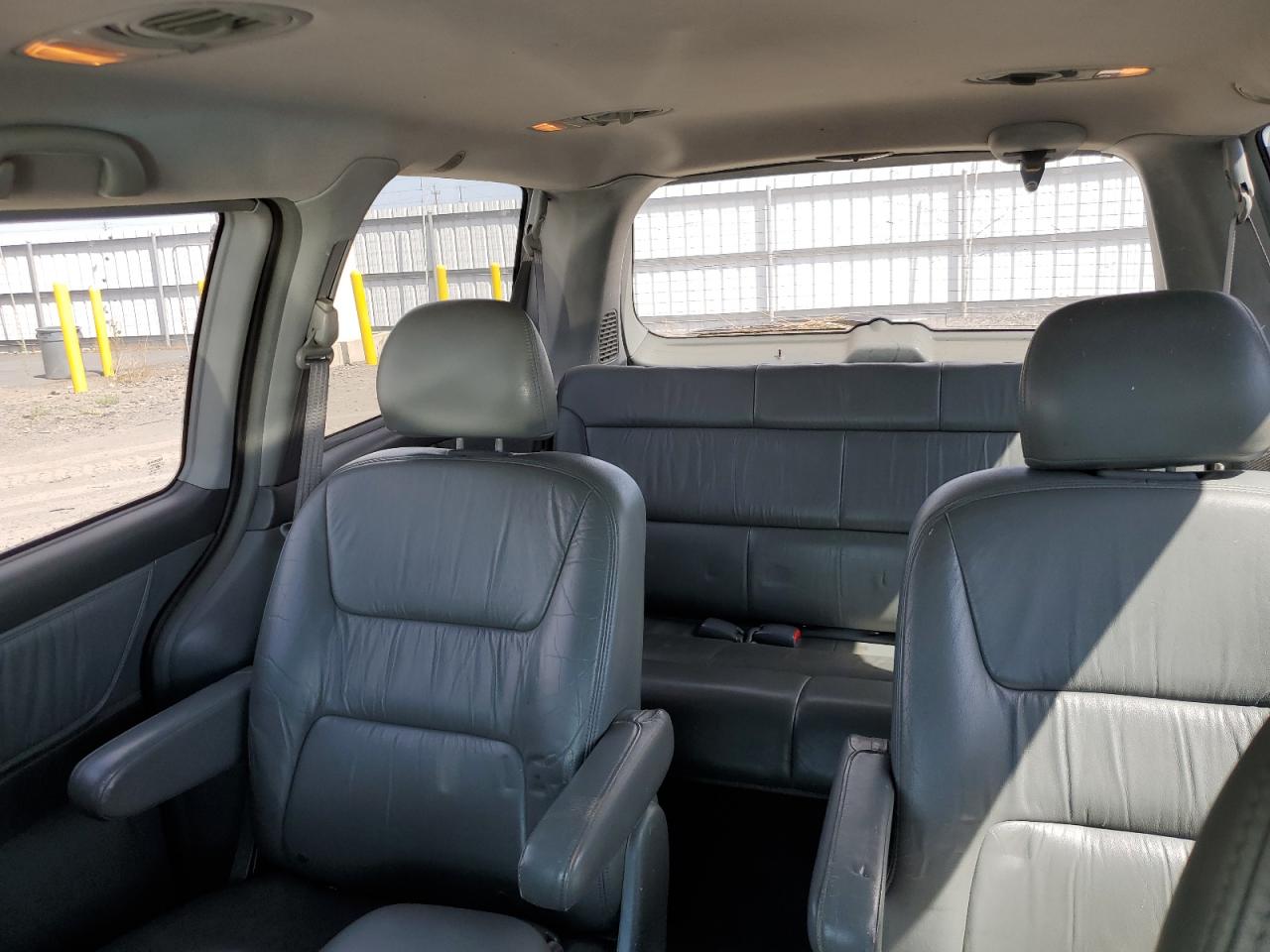 2002 Honda Odyssey Exl VIN: 2HKRL18012H511652 Lot: 68349924