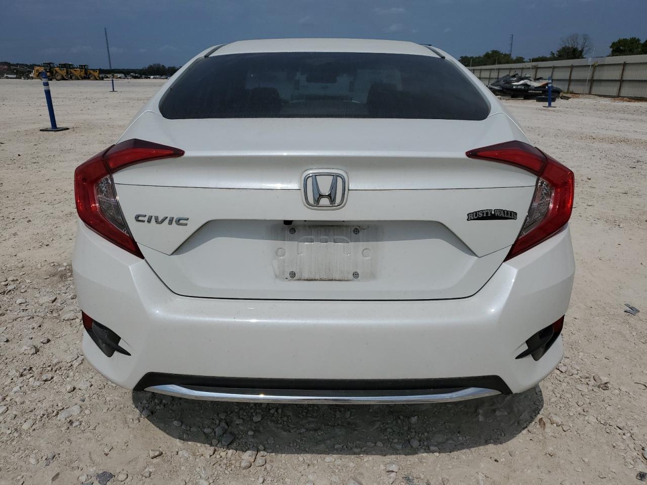 2020 Honda Civic Lx VIN: 19XFC2F65LE013167 Lot: 69004224