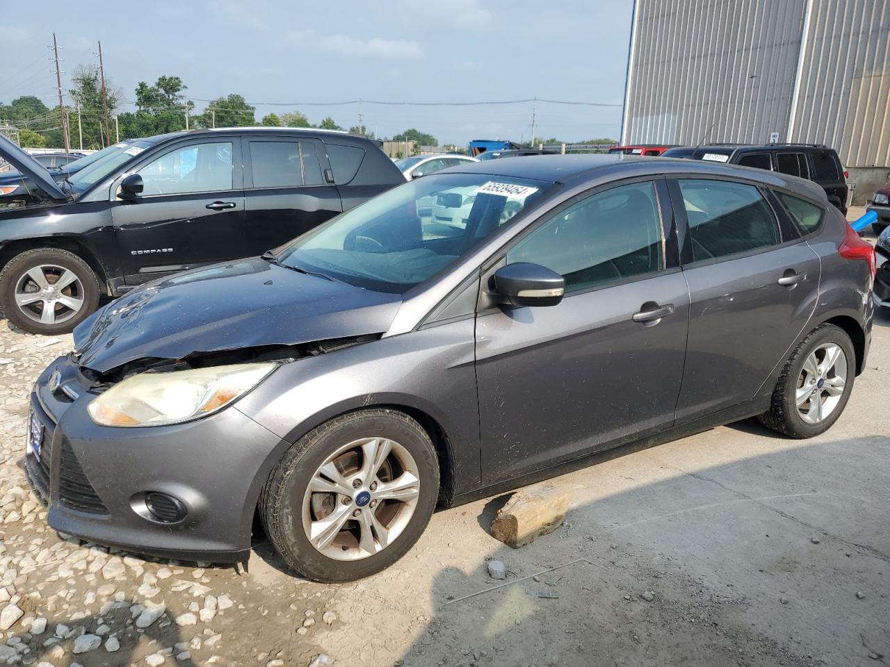 VIN 1FADP3K29EL314075 2014 FORD FOCUS no.1