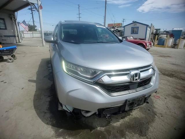 2017 Honda Cr-V Touring VIN: 5J6RW1H91HL014475 Lot: 65806344