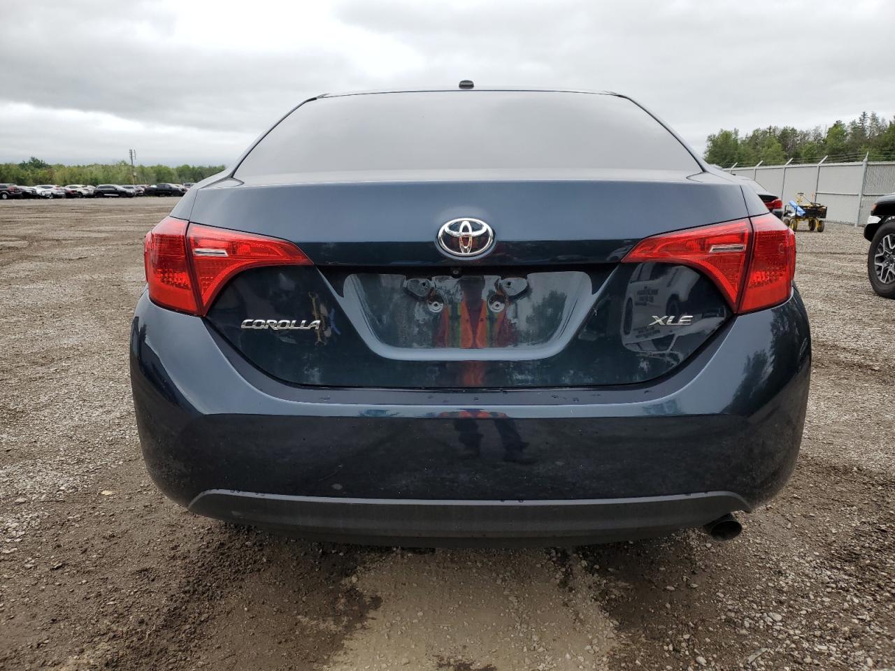 2018 Toyota Corolla L VIN: 2T1BURHE7JC986488 Lot: 67823144