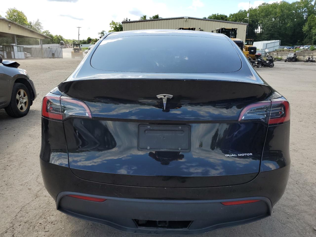 2023 Tesla Model Y VIN: 7SAYGDEE4PA036974 Lot: 67458414