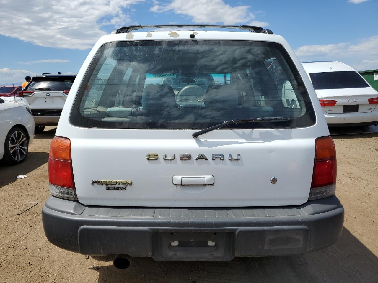 1999 Subaru Forester L VIN: JF1SF6354XH708450 Lot: 67883284